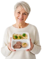 Teresa z pudełkiem cateringu Eat Fit